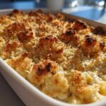 Close-up of a baked leftover turkey casserole featuring a golden, crunchy breadcrumb topping.